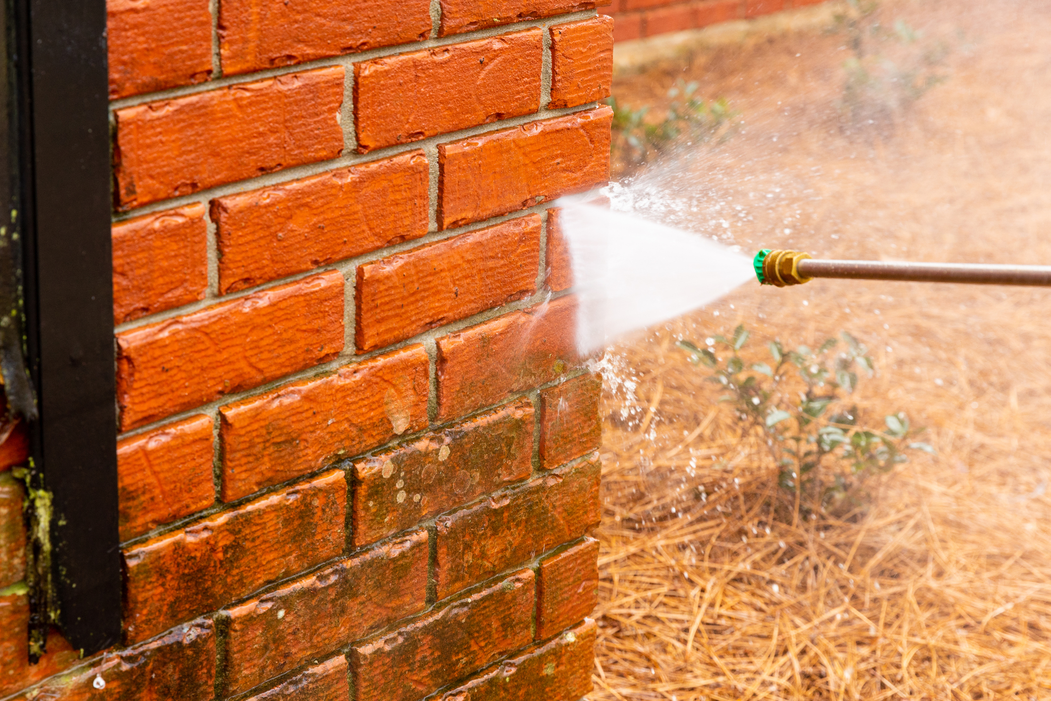 Power washing a brick wall near Broadview Heights, Ohio