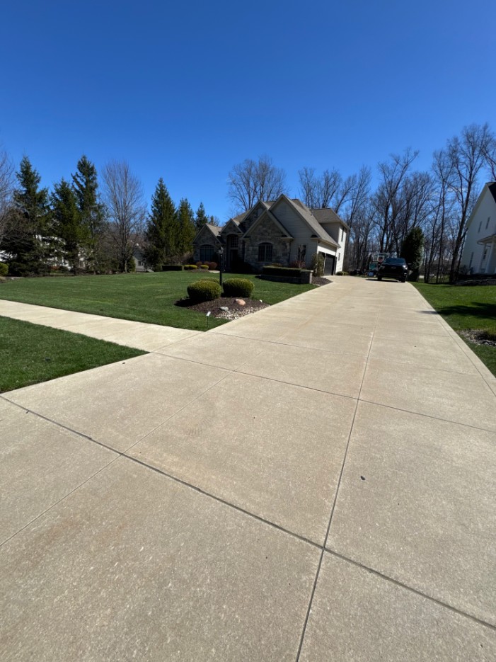 Clean residential driveway after power washing in Cleveland