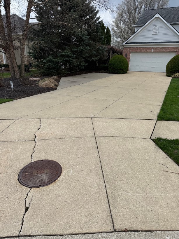 Clean residential driveway after power washing in Cleveland
